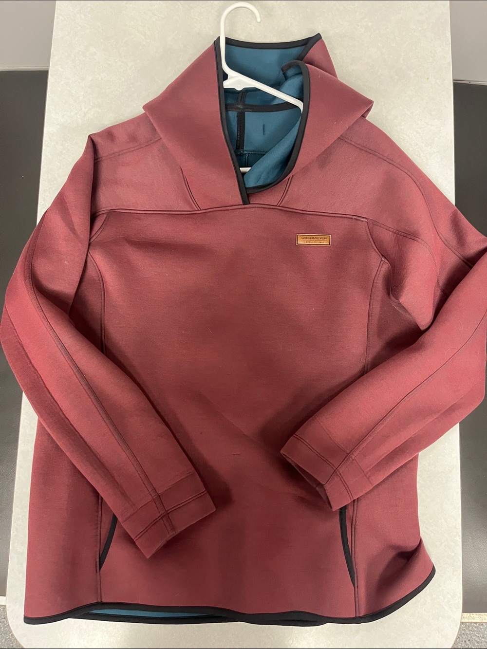 Obermeyer Rust Colored Hooded Ski Pullover with Navy Trim